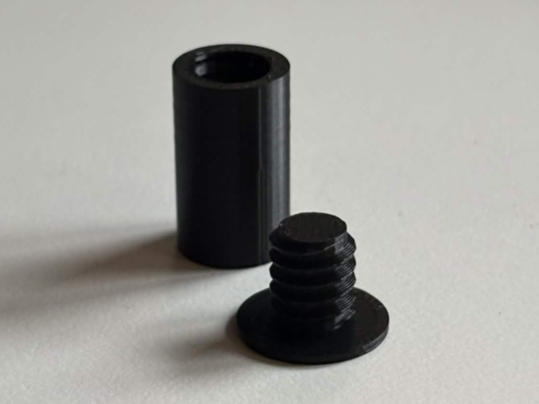 Keyring hanger with hidden screw