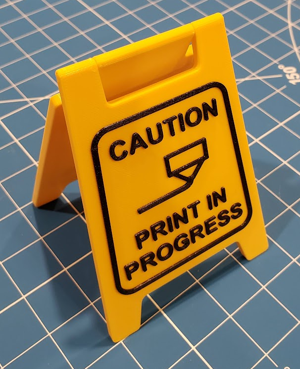 Caution Print In Progress Sign