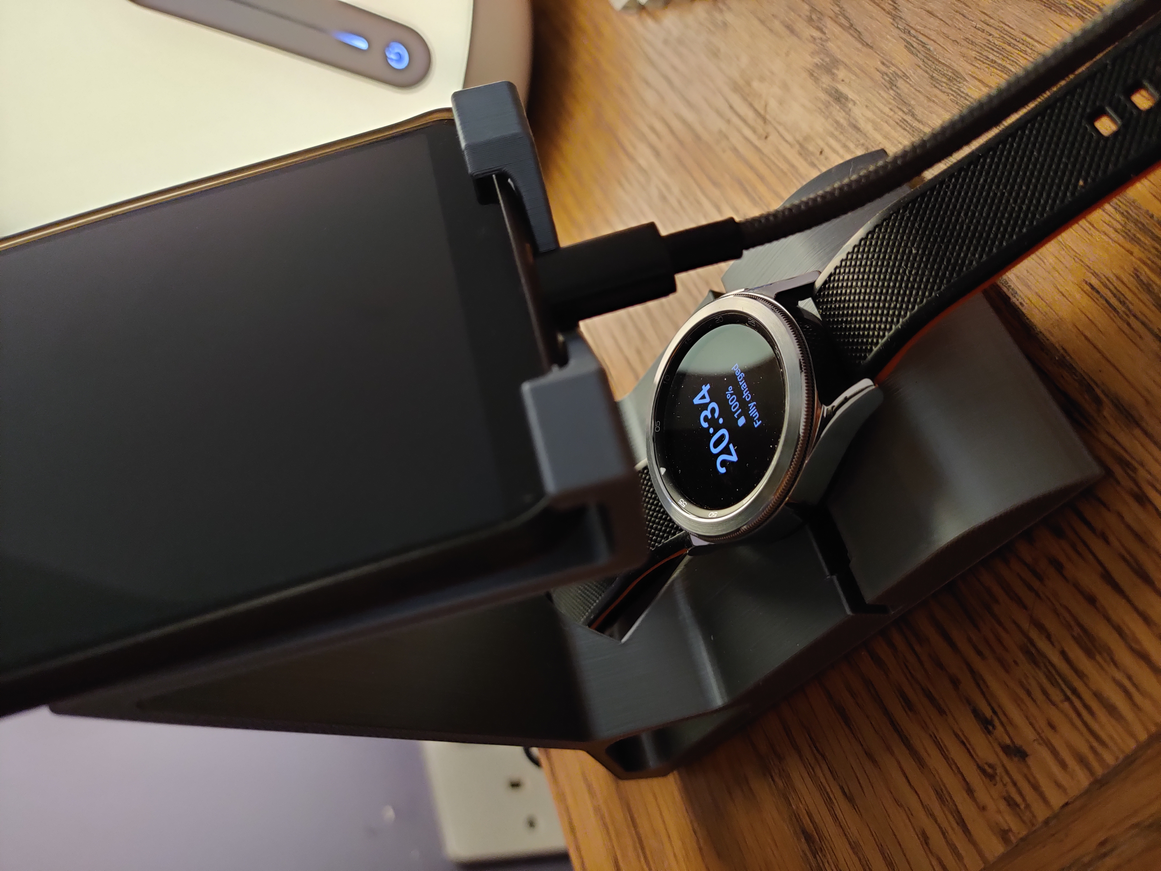 Phone stand with Samsung Galaxy watch 4 charging