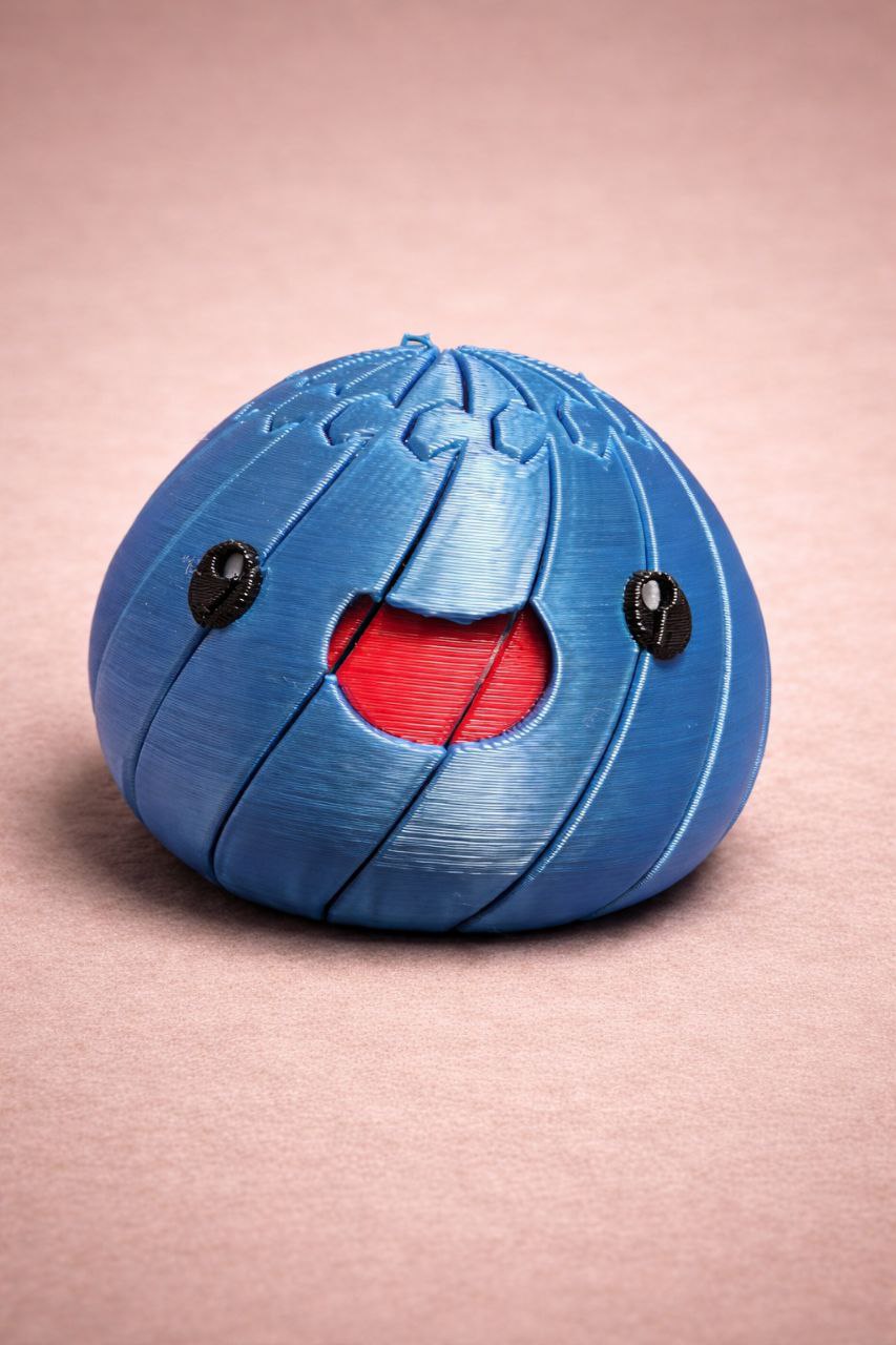 Expandable Fidget Slime Smiley β Articulated Slime Face Stress Toy