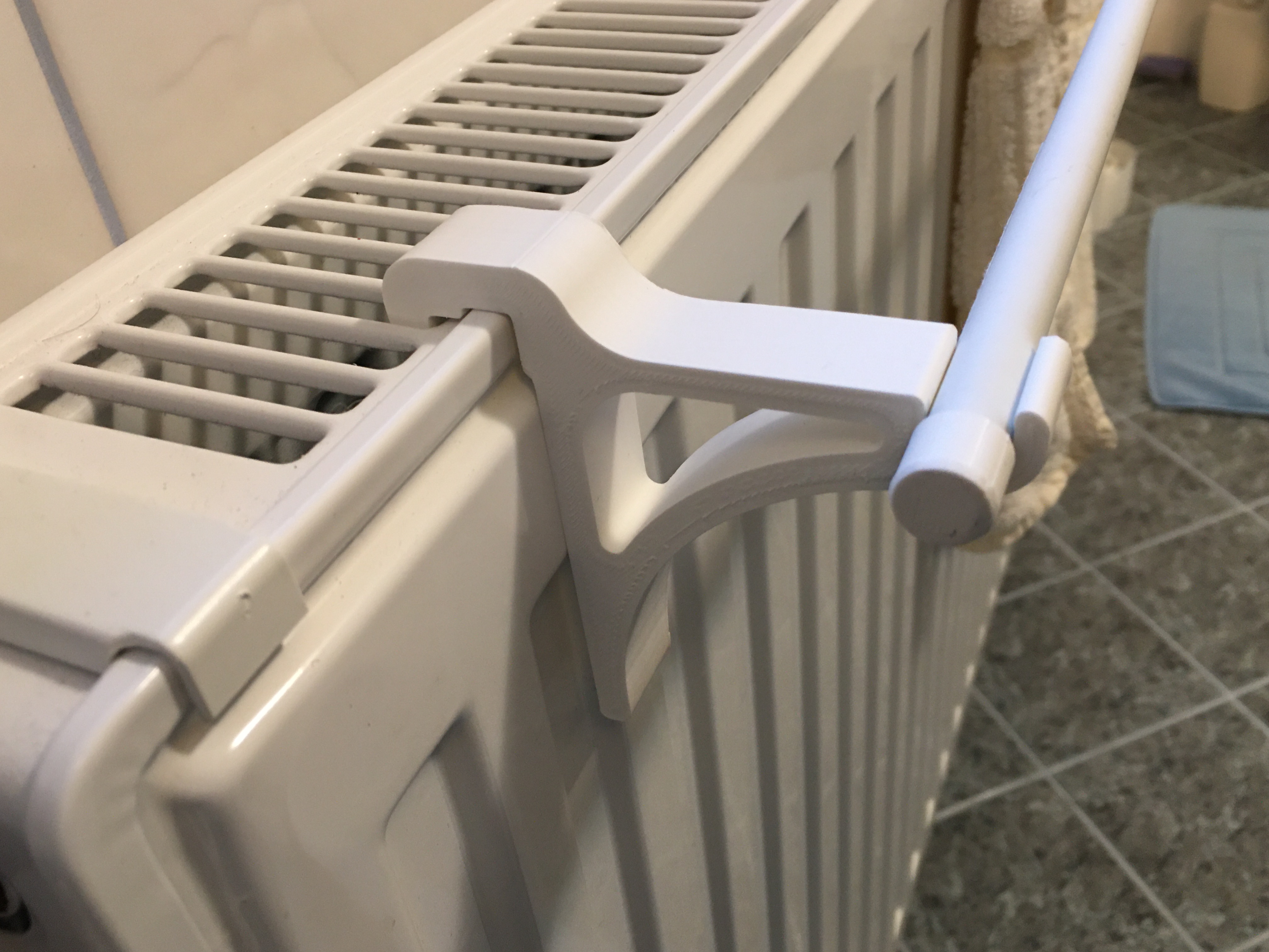 Radiator hooks for towel rail
