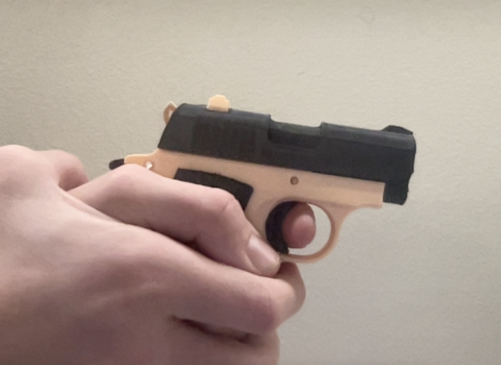 Stress shot mini 1911 and gravity knife