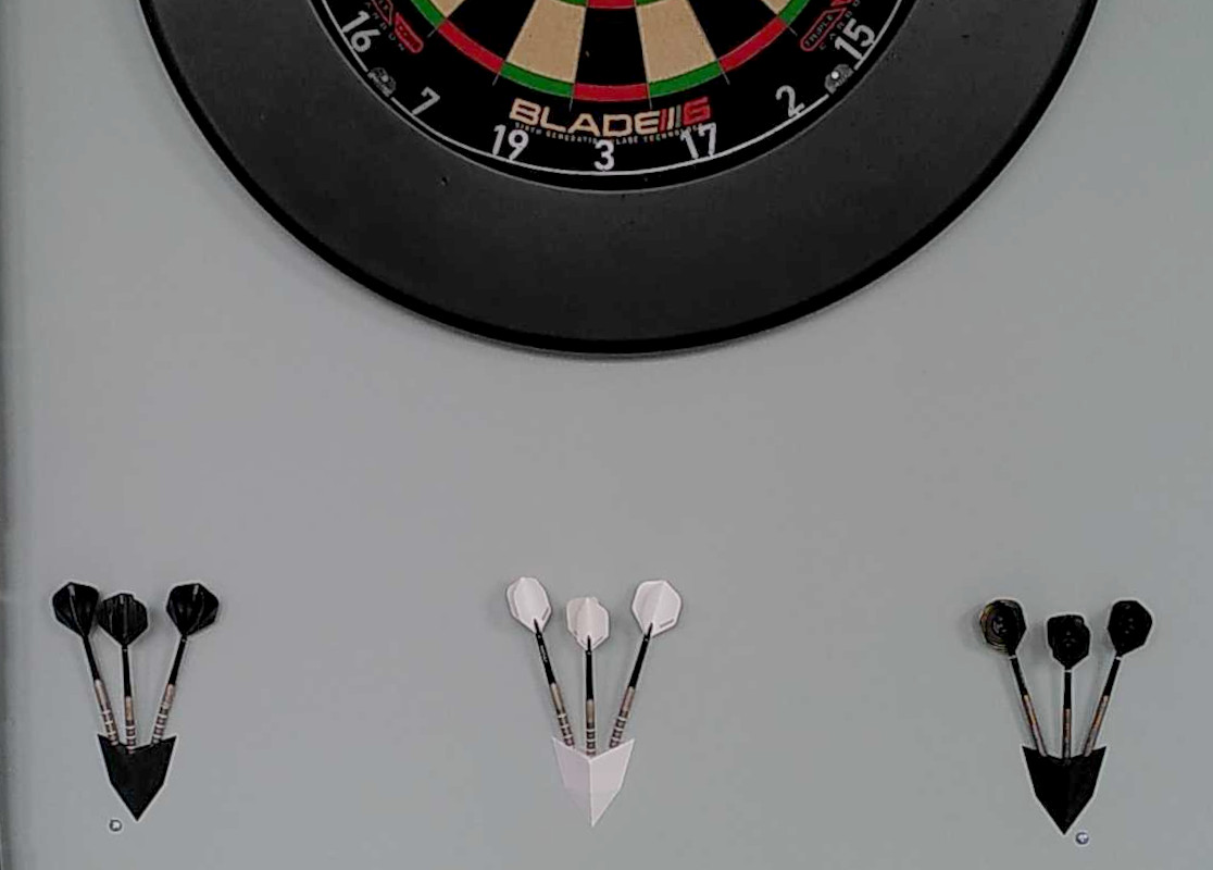 Wall mounted darts holder with screw hole